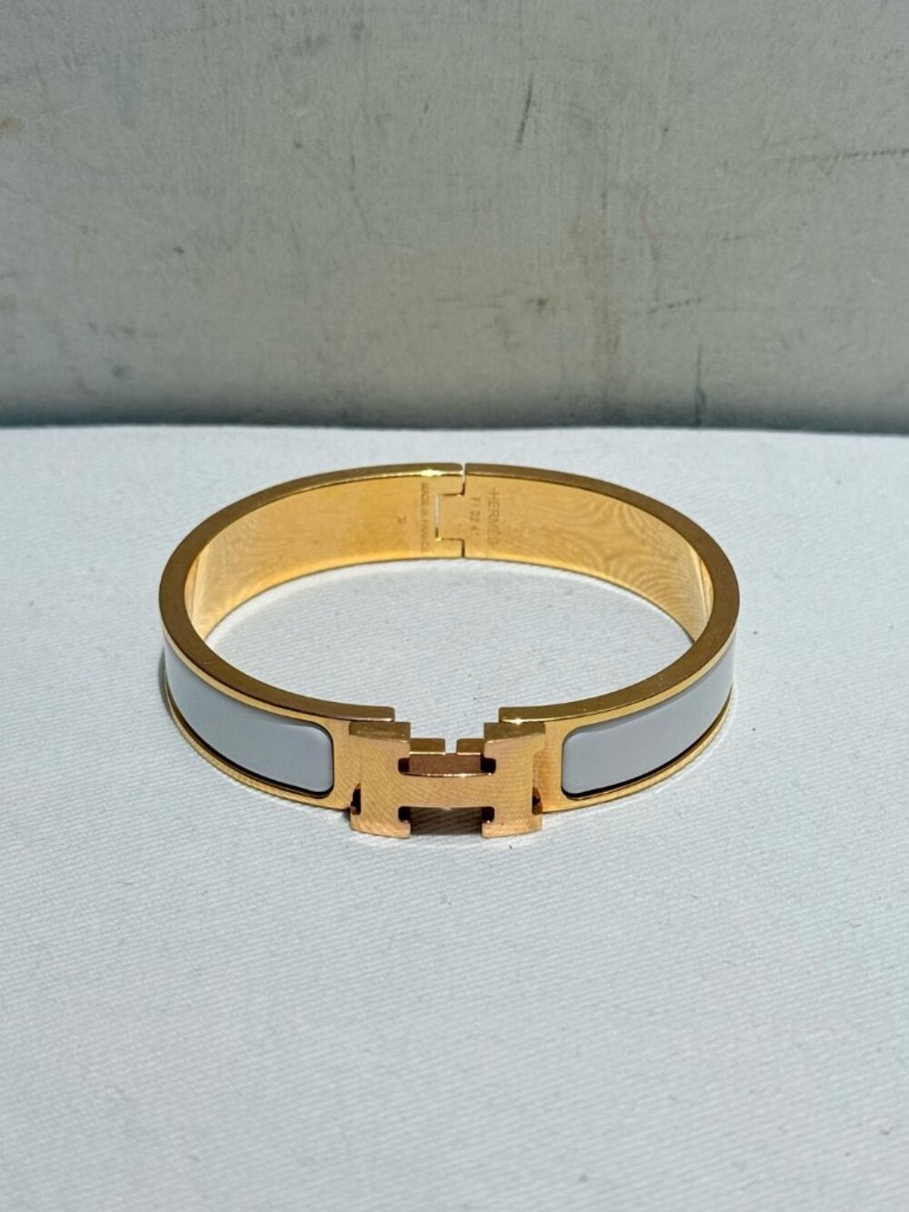 Hermès Clic H White Enamel Bracelet with Gold-Tone Hardware